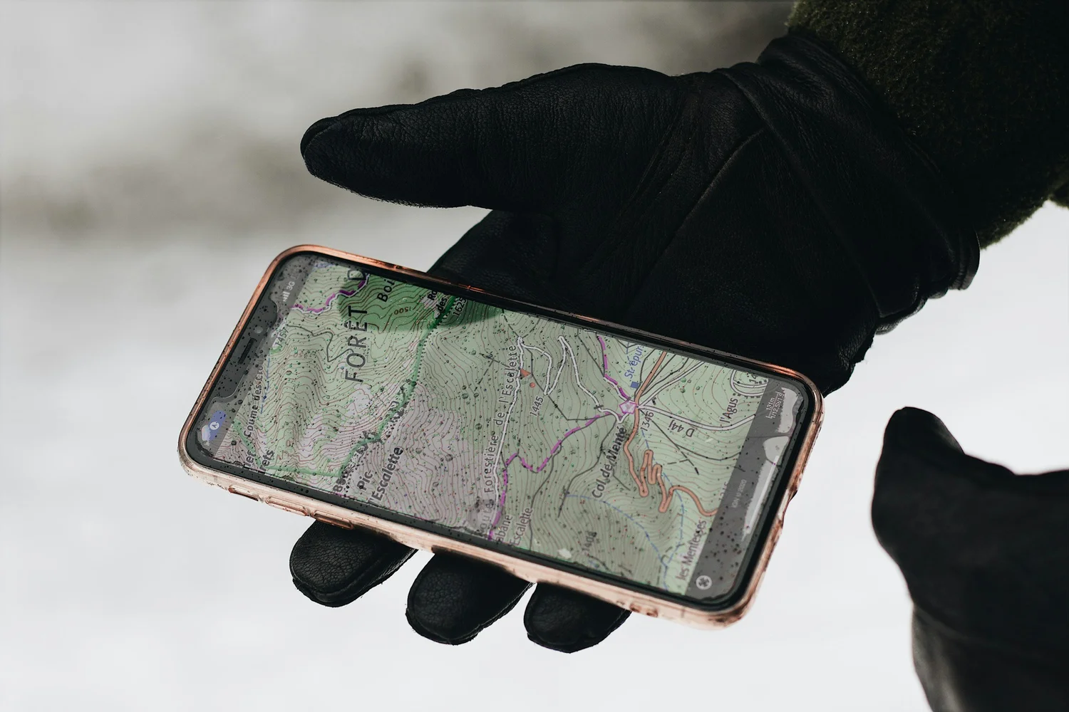 Technician checking in on a mobile device at a commercial site | Gaboras Construction